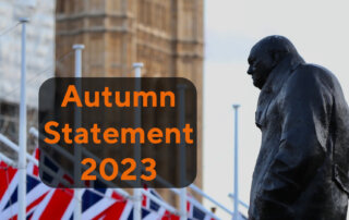 Autumn Statement 2023 Winston Churchill statue in front of the Houses of Parliament.
