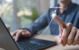 A limited company director reviewing pension contribution options to reduce Corporation Tax and build long‑term retirement savings.